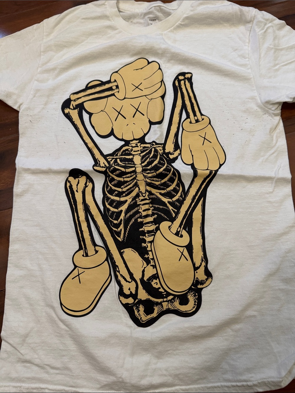 White Graphic Skeleton Tee with Yellow Accent - Women Tops